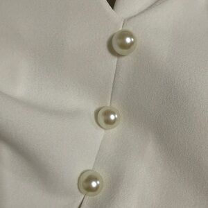 Elegant Cream Blouse with Pearl Buttons
